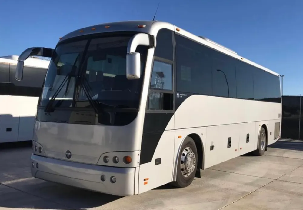 White 50 passenger charter bus for Bay Area day trips and wine tours