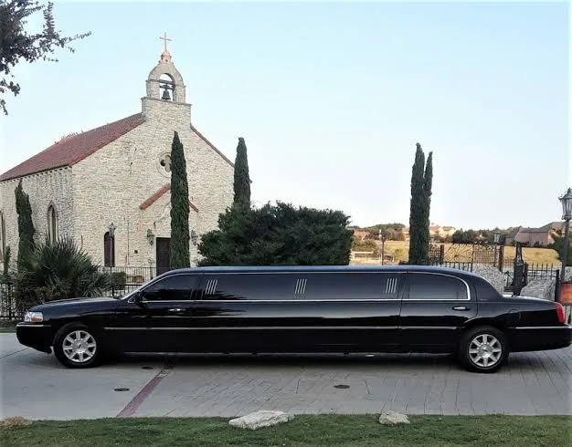 Black stretch limousine outside a church for a San Francisco church wedding