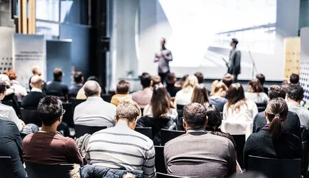 Conference attendees for group bus transportation in the Bay Area