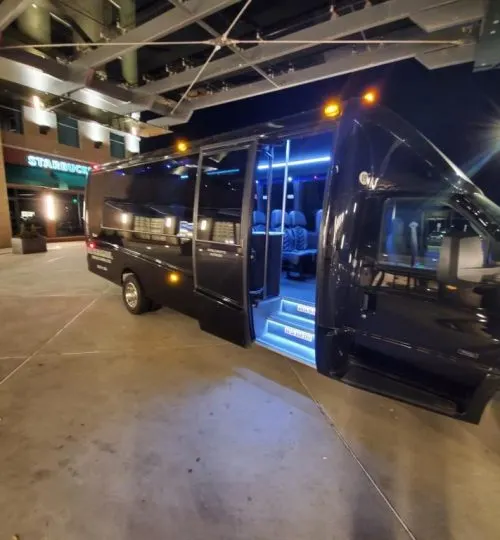 Mini coach with open door for evening event transportation in the Bay Area