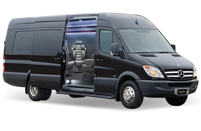 Black Mercedes Jet Sprinter van with its side door open showing a captain seat